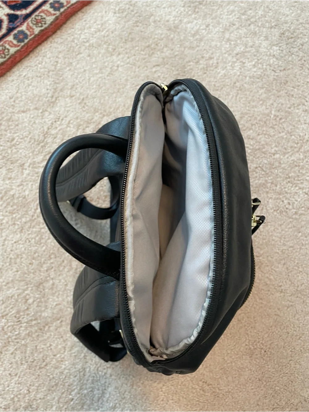Tumi Black Leather Backpack with Goldtone Hardware